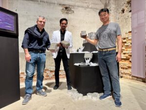 Prof. Novoselov, Ar. Abhimanyu Goel, and collaborator Mr Joung Lee proudly display graphene-enhanced concrete samples developed for sustainable construction.