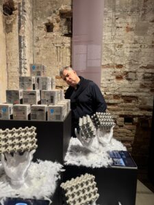 Prof. Novoselov examines modular graphene-enhanced concrete cubes showcasing the synergy of materials science and architectural expression.