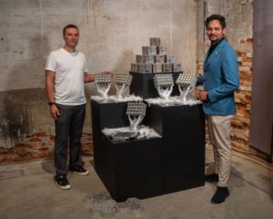 Ar. Abhimanyu Goel and Dr. Maxim Rybin arranging modular graphene concrete blocks for the Venice Biennale 2025 exhibition.