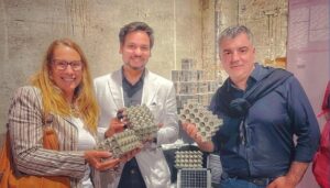 Prof. Novoselov and Ar. Abhimanyu Goel, with International Biochar Initiative President Ms Lucia Brusegan, in front of their installation at the Biennale Architettura 2025.
